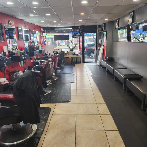 Barber chairs and waiting area at Lilacroix Barbers